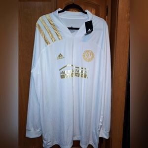 An Adidas Atlanta United official MLS long sleeve jersey in multiple sizes.